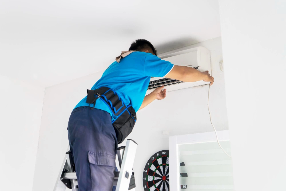 Technician Install split AC unit